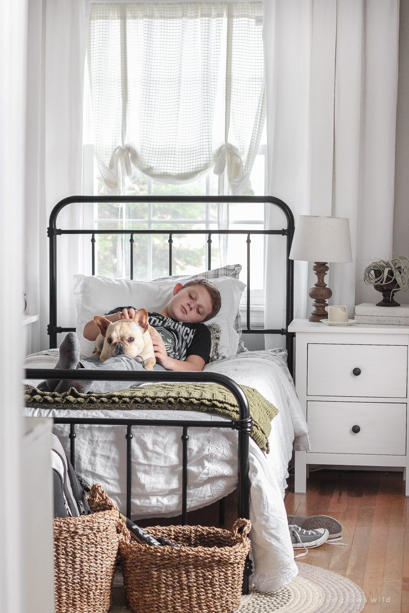 This teenage boy's bedroom is just the right mixture of masculine, simple and cozy. 