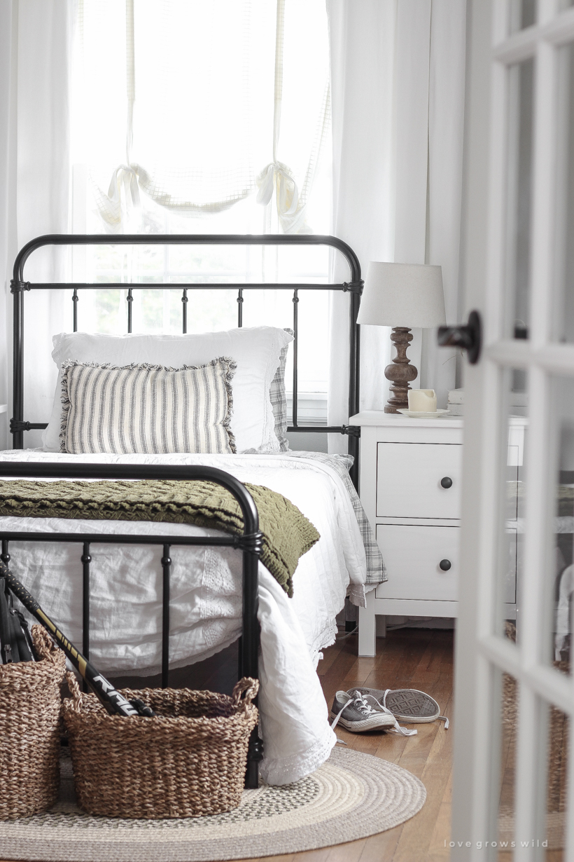 This teenage boy's bedroom is just the right mixture of masculine, simple and cozy. 