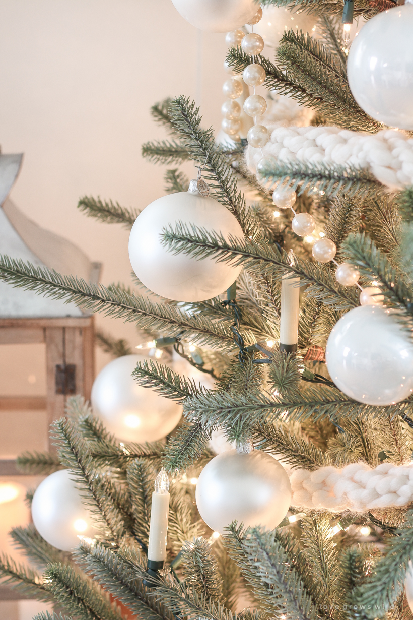 A beautiful neutral, light and bright living room decorated for Christmas