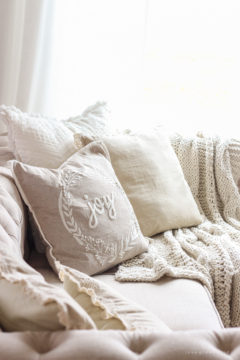 A beautiful neutral, light and bright living room decorated for Christmas