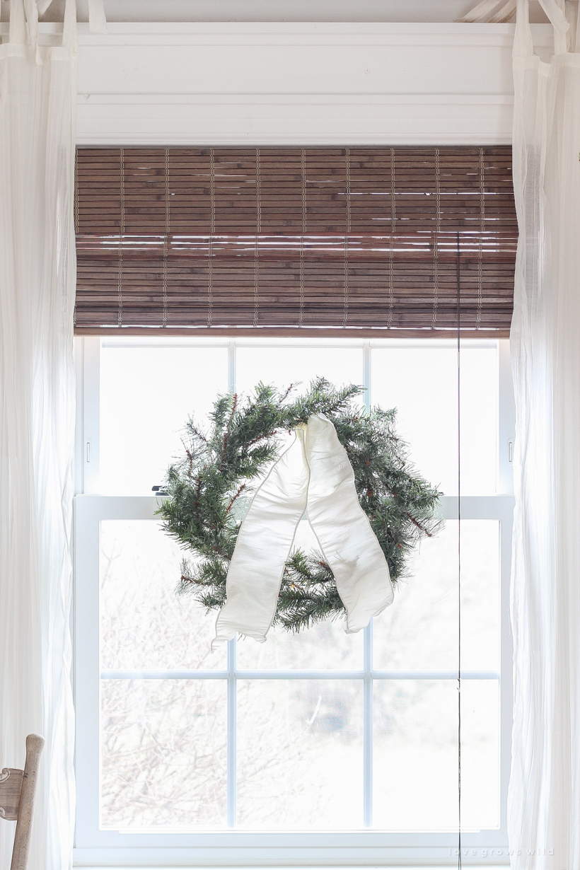 A beautiful neutral, light and bright living room decorated for Christmas