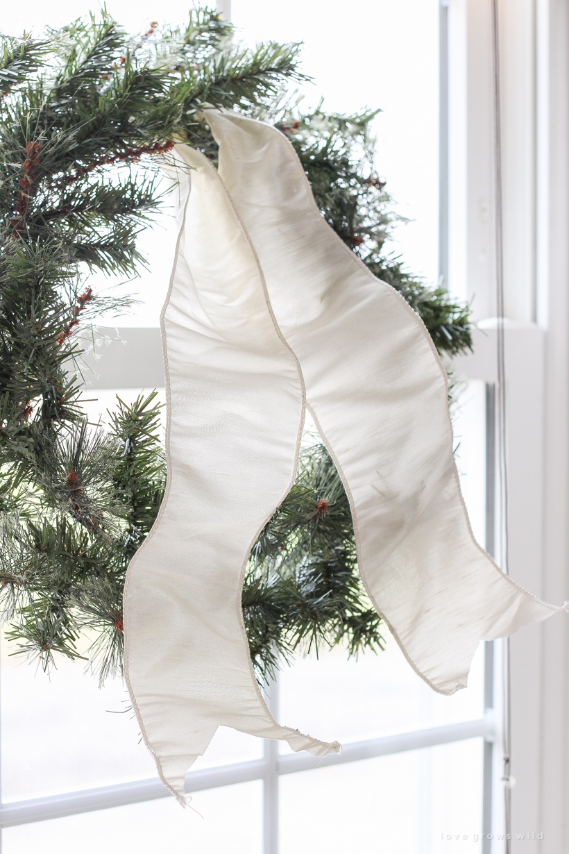 A beautiful neutral, light and bright living room decorated for Christmas