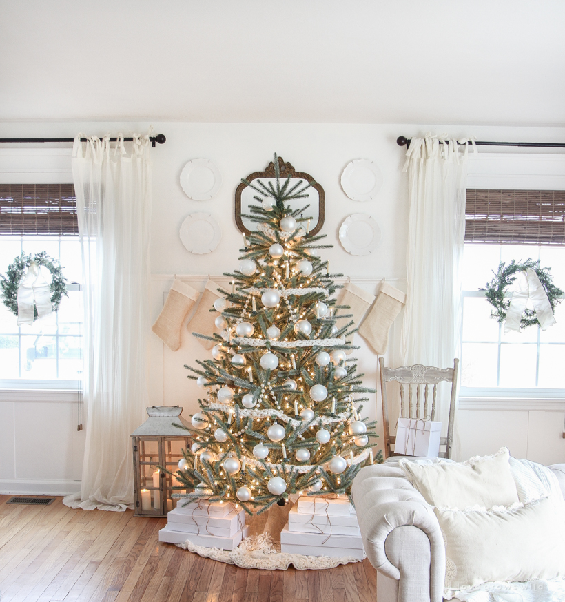 A beautiful neutral, light and bright living room decorated for Christmas