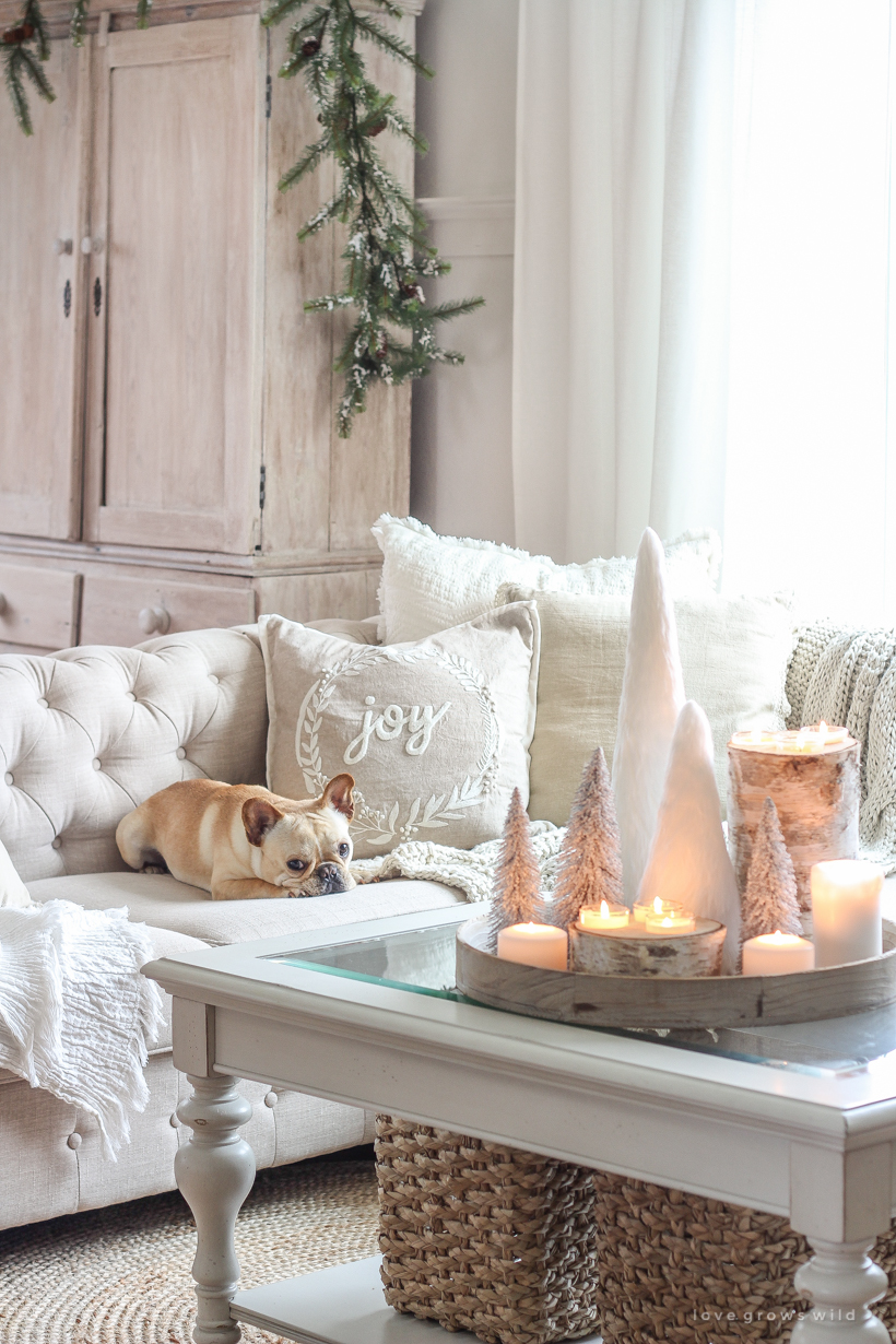 A beautiful neutral, light and bright living room decorated for Christmas