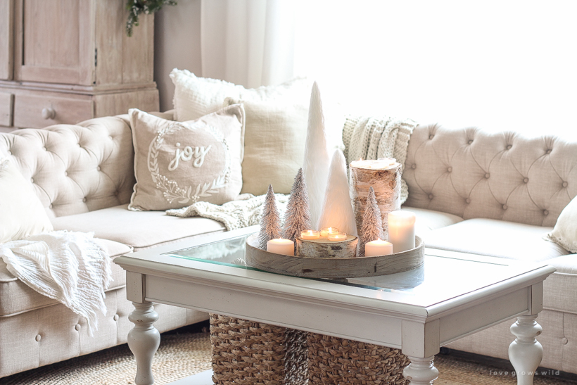 A beautiful neutral, light and bright living room decorated for Christmas