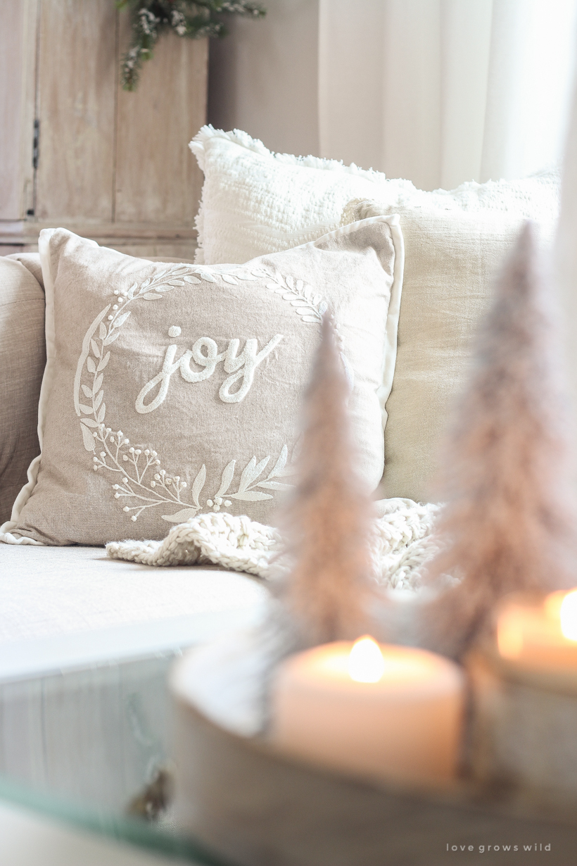 A beautiful neutral, light and bright living room decorated for Christmas