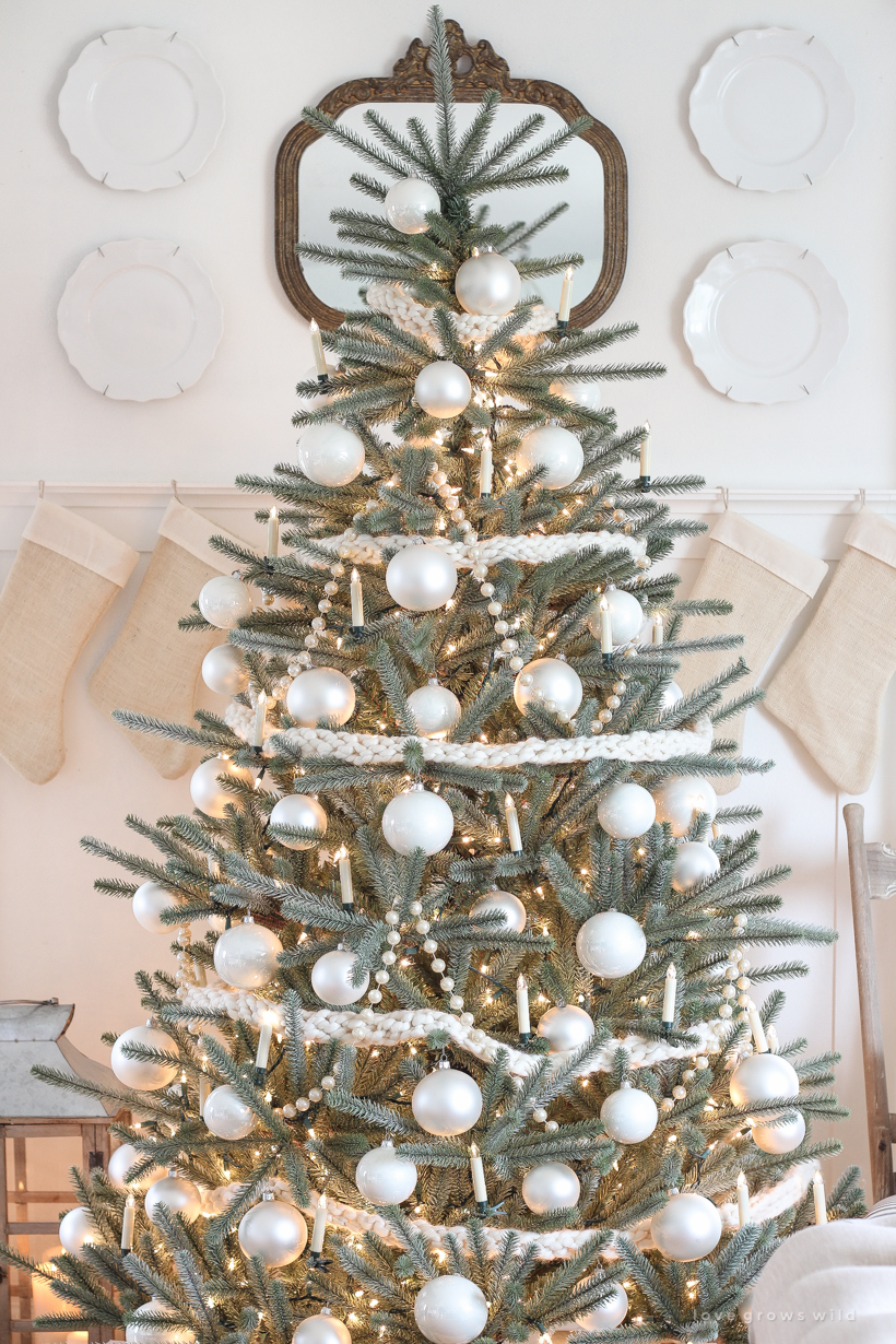 A beautiful neutral, light and bright living room decorated for Christmas