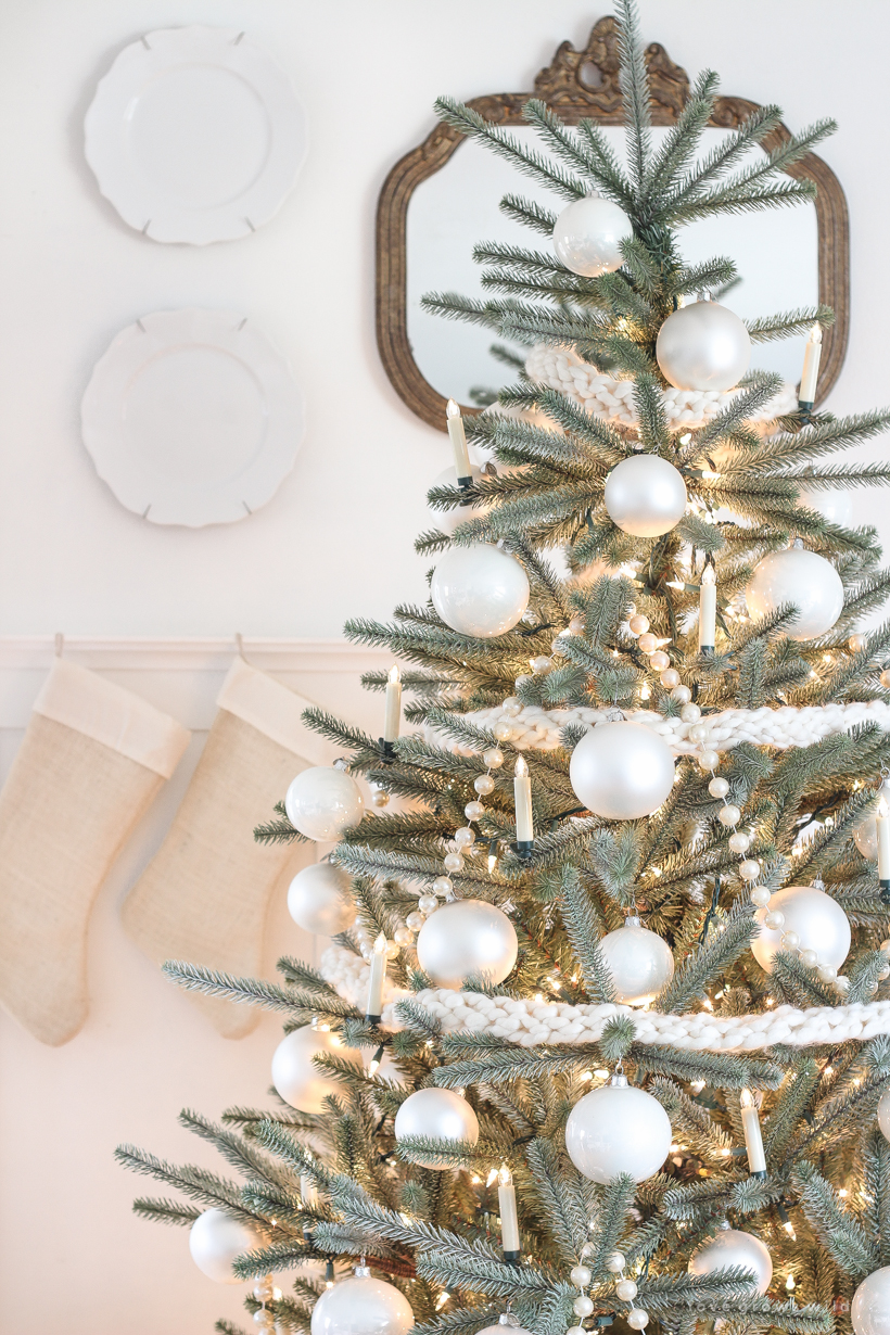 A beautiful neutral, light and bright living room decorated for Christmas