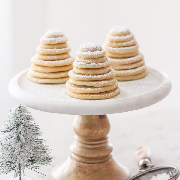 Follow this fun, easy tutorial from Indiana home + lifestyle blogger Liz Fourez to make the cutest little Sugar Cookie Christmas Trees! So easy to make and a perfect holiday activity for kids!