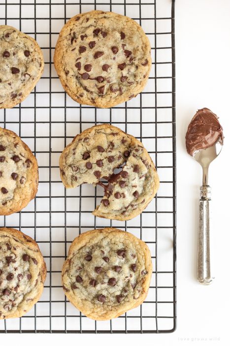 Soft, gooey Nutella stuffed inside the perfect chewy chocolate chip cookie!