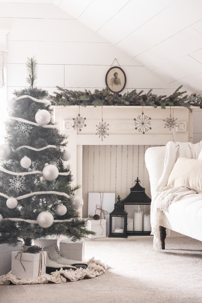 A simple, cozy bedroom decorated for Christmas with a "vintage winter wonderland" theme