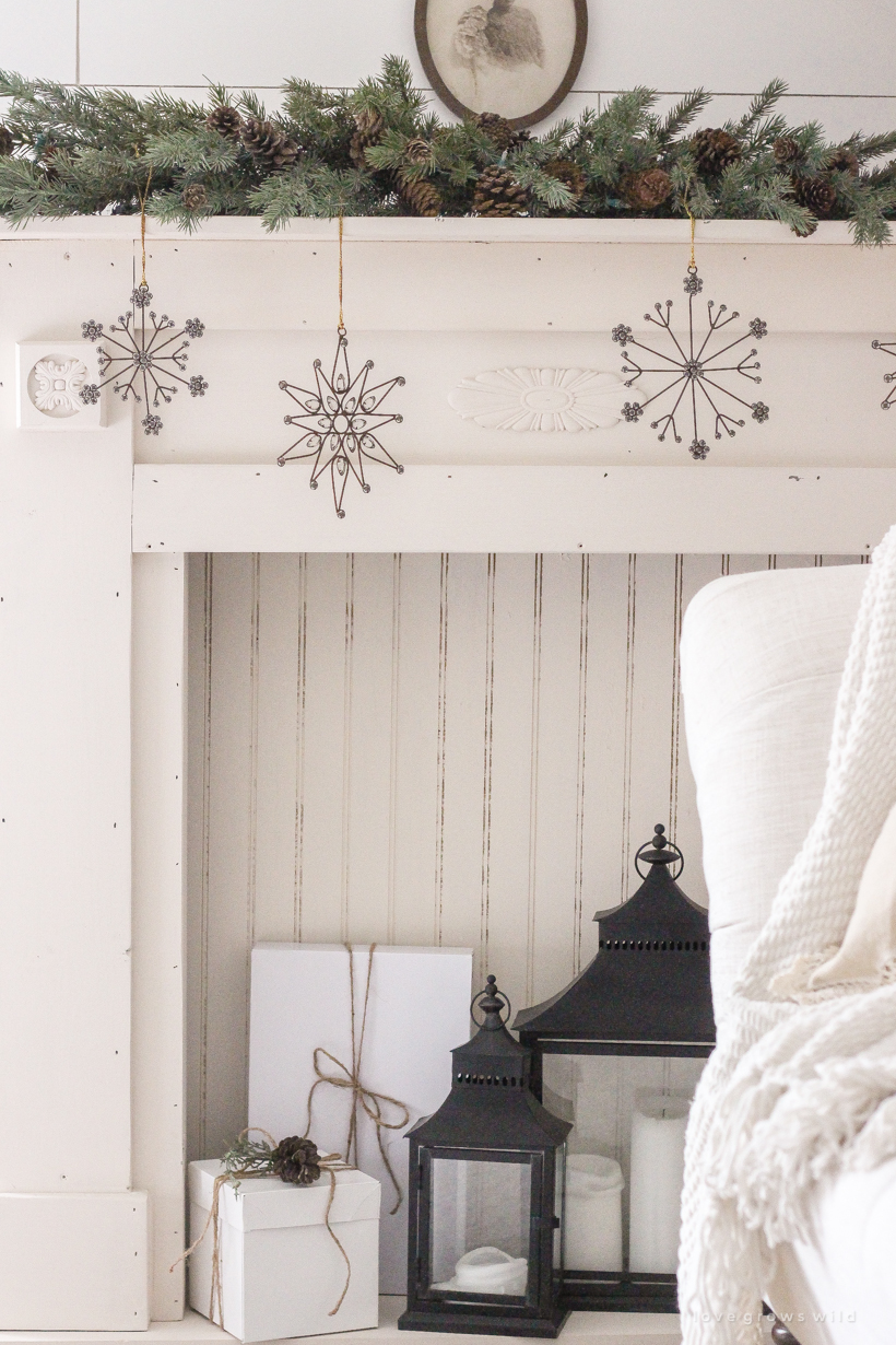 A simple, cozy bedroom decorated for Christmas with a "vintage winter wonderland" theme