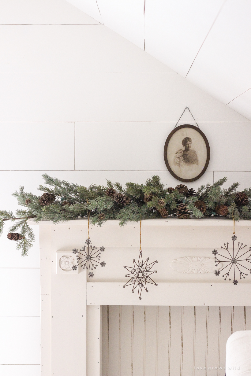 A simple, cozy bedroom decorated for Christmas with a "vintage winter wonderland" theme