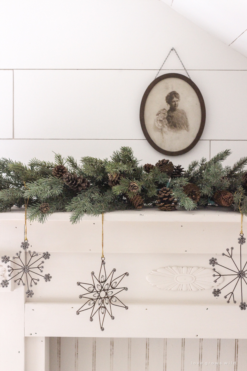 A simple, cozy bedroom decorated for Christmas with a "vintage winter wonderland" theme