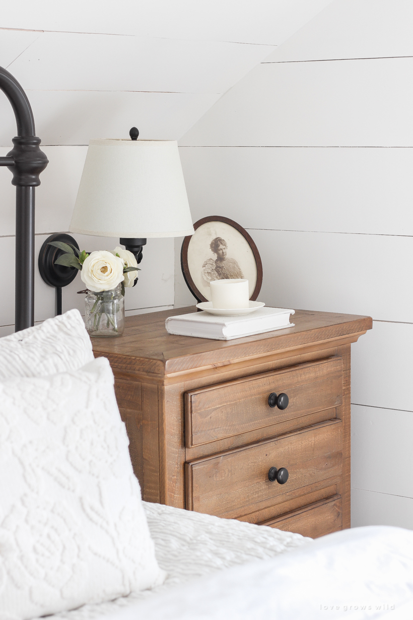 Step inside home and lifestyle blogger Liz Fourez's charming master bedroom with gorgeous farmhouse details and neutral color palette. 