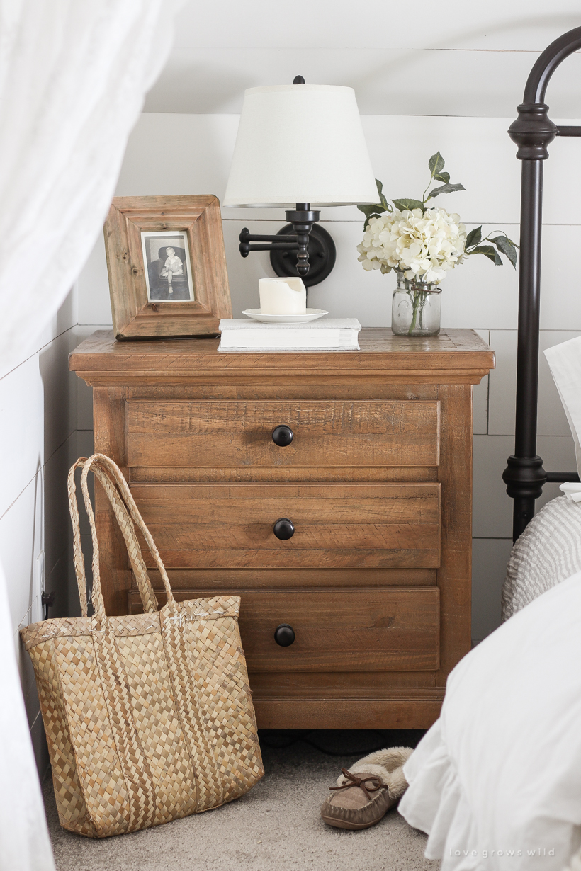 Step inside home and lifestyle blogger Liz Fourez's charming master bedroom with gorgeous farmhouse details and neutral color palette. 