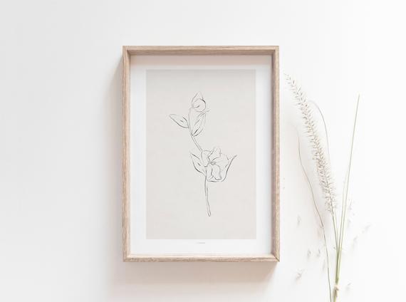 Home and lifestyle blogger Liz Fourez shares the most affordable way to use artwork in your home and a collection of her favorite neutral nature-inspired prints