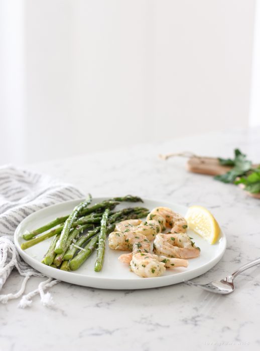 Easy one pan dinner idea for Roasted Shrimp and Asparagus that is healthy and ready in under 30 minutes!