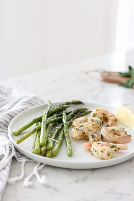 Easy one pan dinner idea for Roasted Shrimp and Asparagus that is healthy and ready in under 30 minutes!