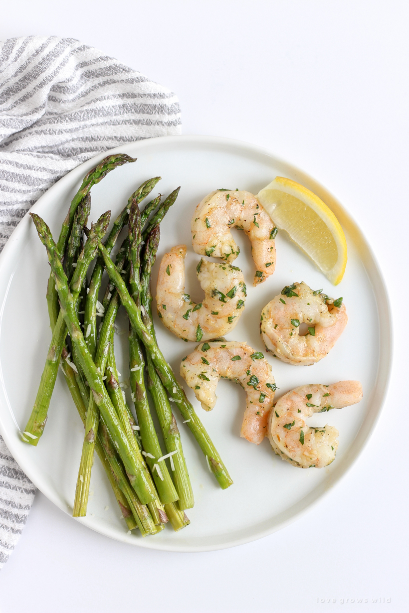 Easy one pan dinner idea for Roasted Shrimp and Asparagus that is healthy and ready in under 30 minutes!