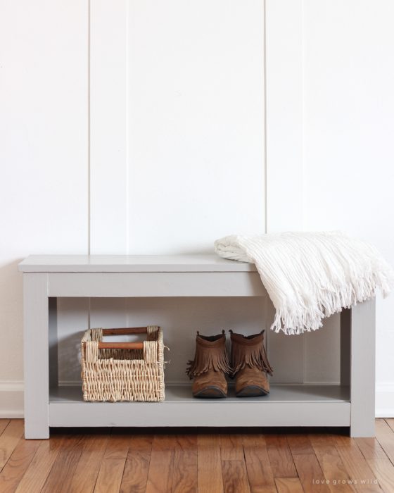 Home and lifestyle blogger Liz Fourez shows how to make a simple bench with storage that would be perfect for an entryway or at the foot of a bed. Follow her easy step-by-step photo tutorial to create this beautiful DIY bench!