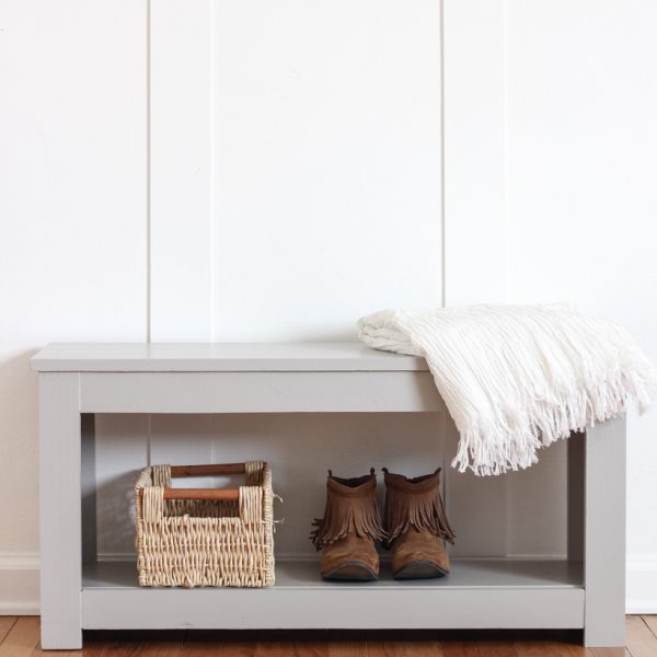 Home and lifestyle blogger Liz Fourez shows how to make a simple bench with storage that would be perfect for an entryway or at the foot of a bed. Follow her easy step-by-step photo tutorial to create this beautiful DIY bench!