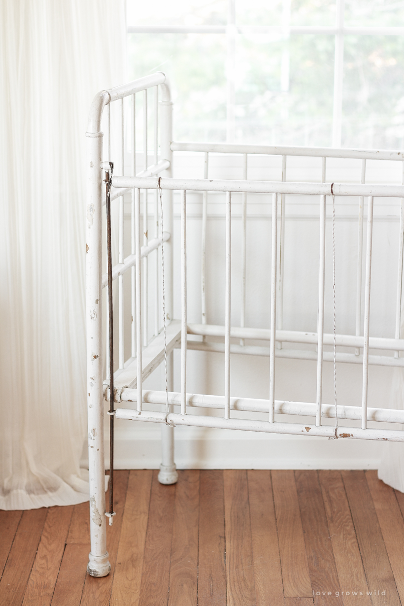 Home and lifestyle blogger Liz Fourez turns a wooden antique crib into an adorable bench with a quilted cushion. 