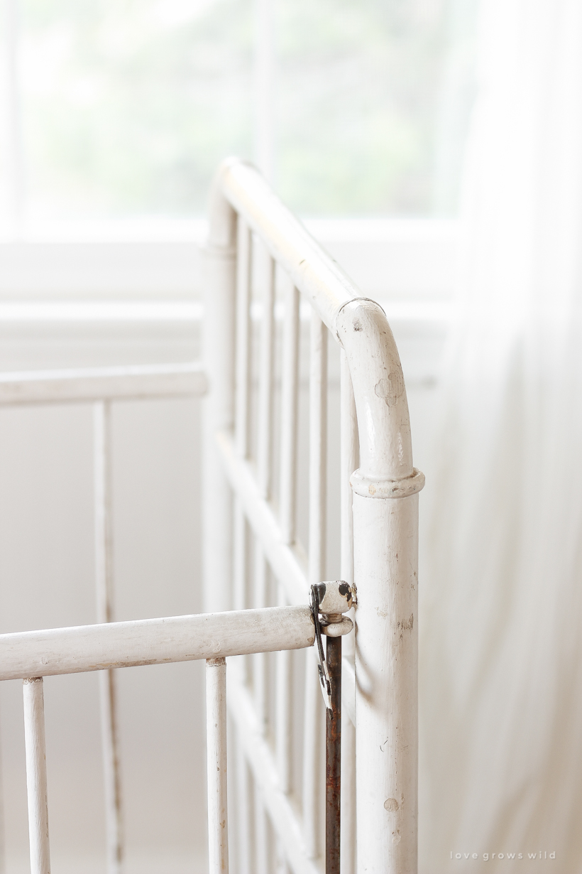 Home and lifestyle blogger Liz Fourez turns a wooden antique crib into an adorable bench with a quilted cushion. 