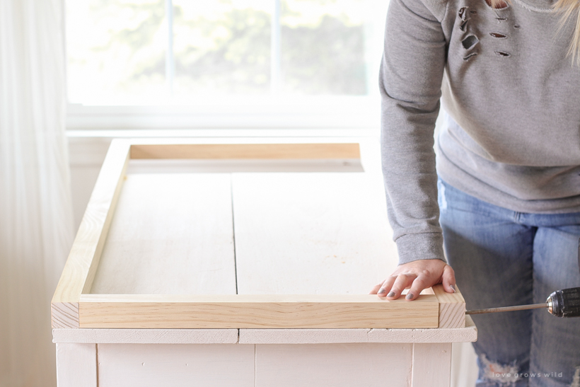 Home and lifestyle blogger Liz Fourez shares the new coffee table she built for her living room with a full tutorial and step-by-step photos. Read this blog post for more details!