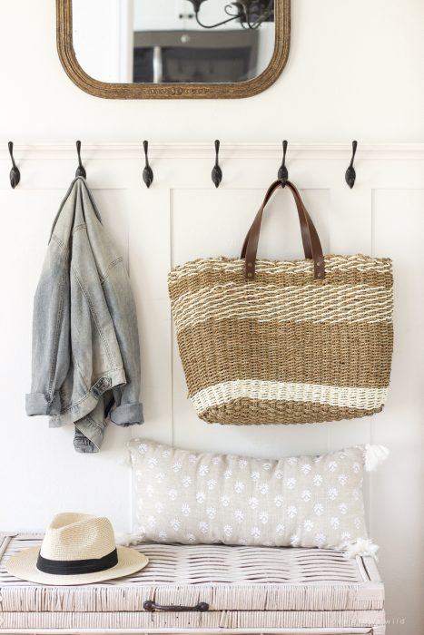 Beautiful styled entryway with coat hooks