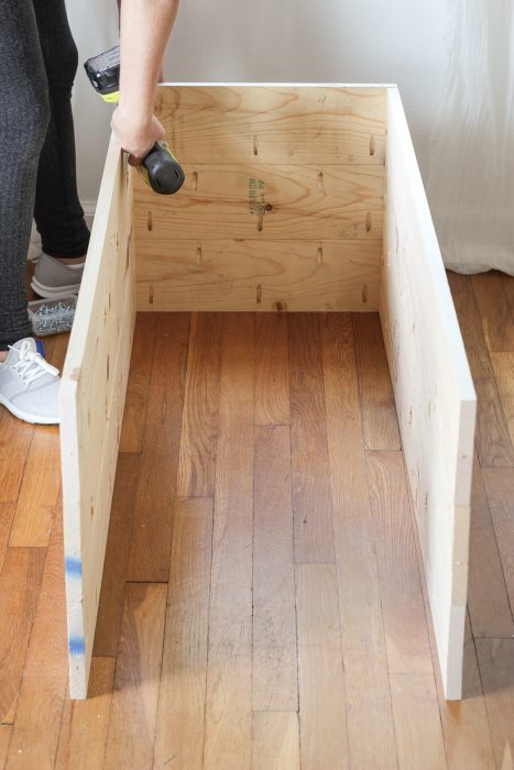 DIY plans and tutorial for a beautiful wood storage trunk with step-by-step photos