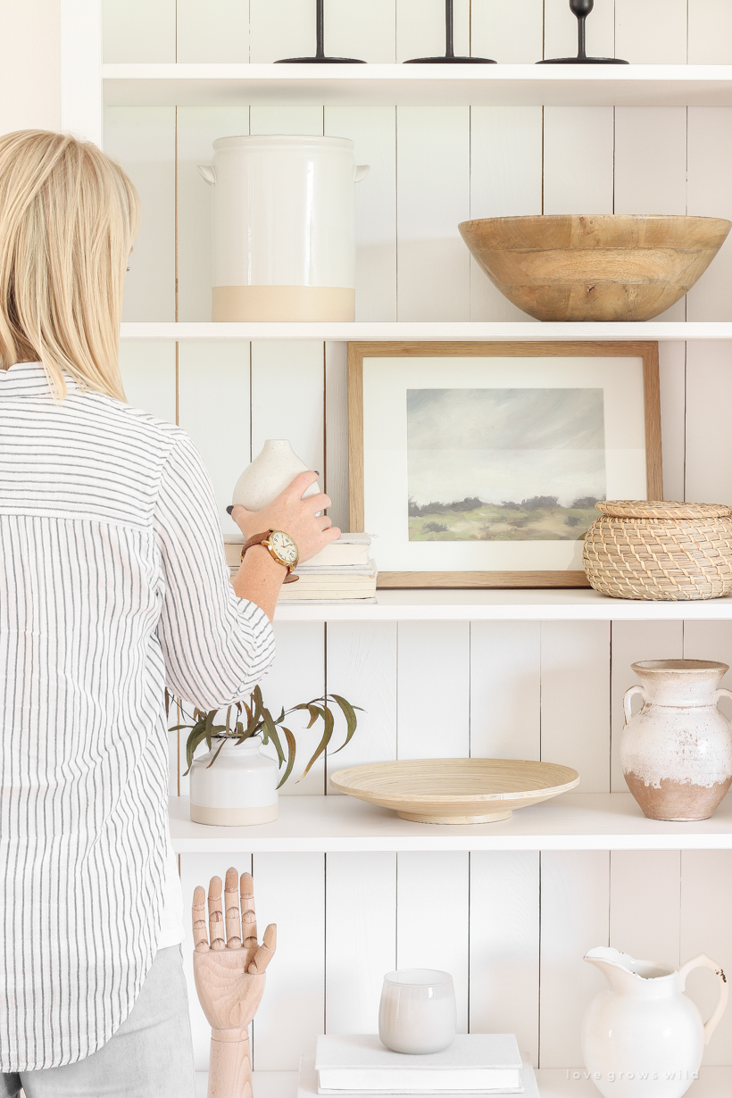 Use this one simple trick to upgrade your IKEA bookshelf for a more high end look! You'll be so glad you did. Tutorial at LoveGrowsWild.com