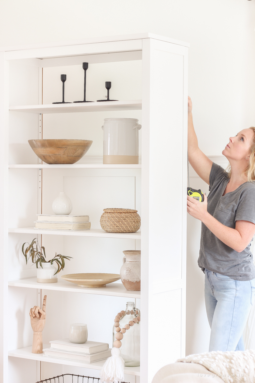 Use this one simple trick to upgrade your IKEA bookshelf for a more high end look! You'll be so glad you did. Tutorial at LoveGrowsWild.com