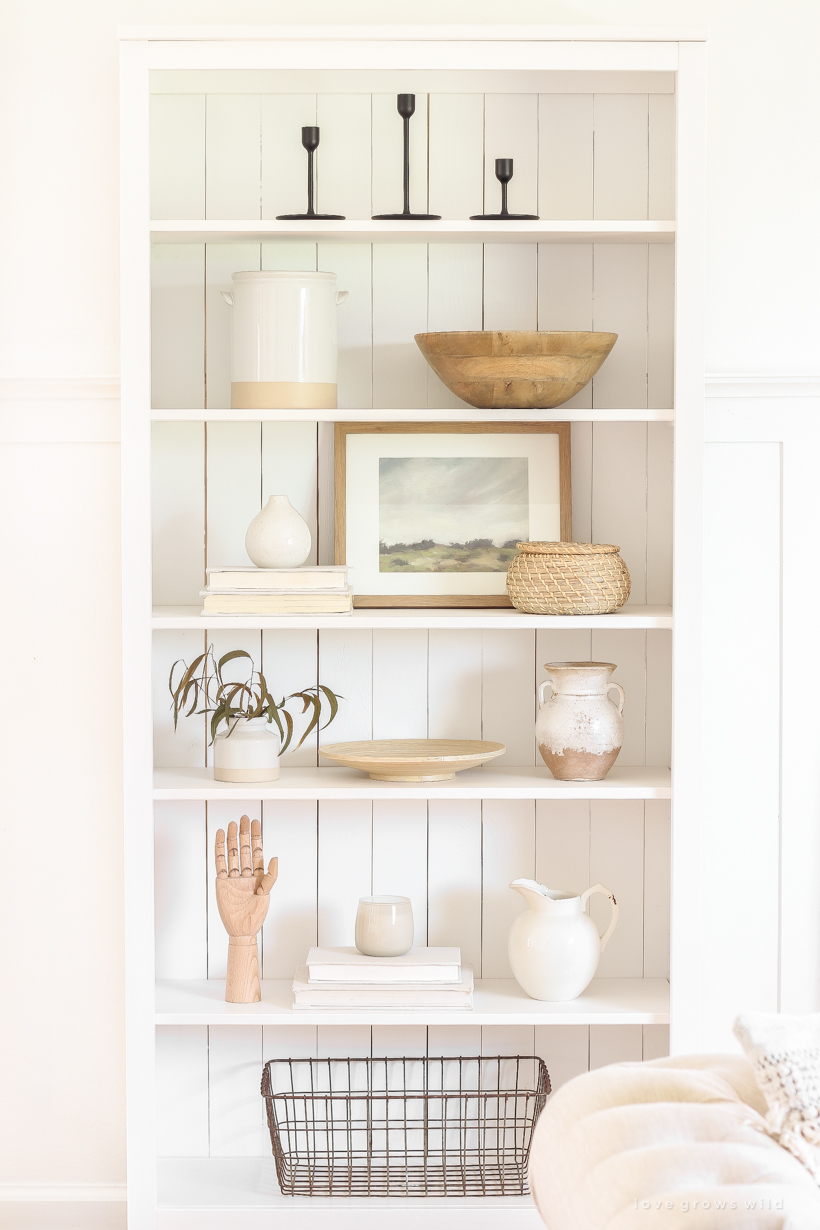 Use this one simple trick to upgrade your IKEA bookshelf for a more high end look! You'll be so glad you did. Tutorial at LoveGrowsWild.com