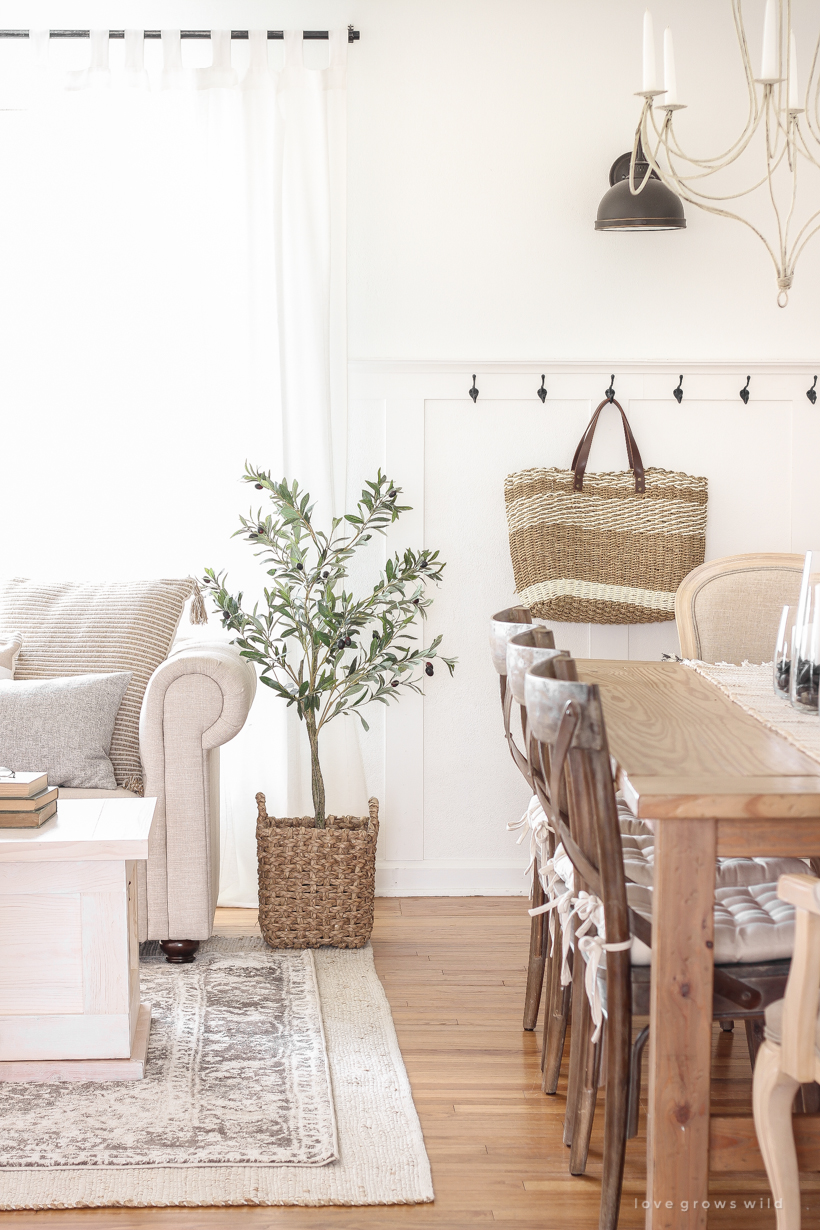 A warm and cozy living room with lots of layers, texture and pattern for fall