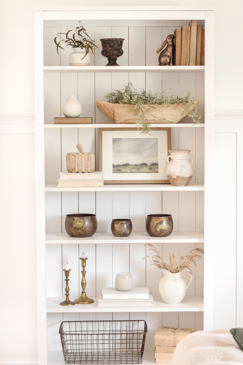 A warm and cozy living room with lots of layers, texture and pattern for fall