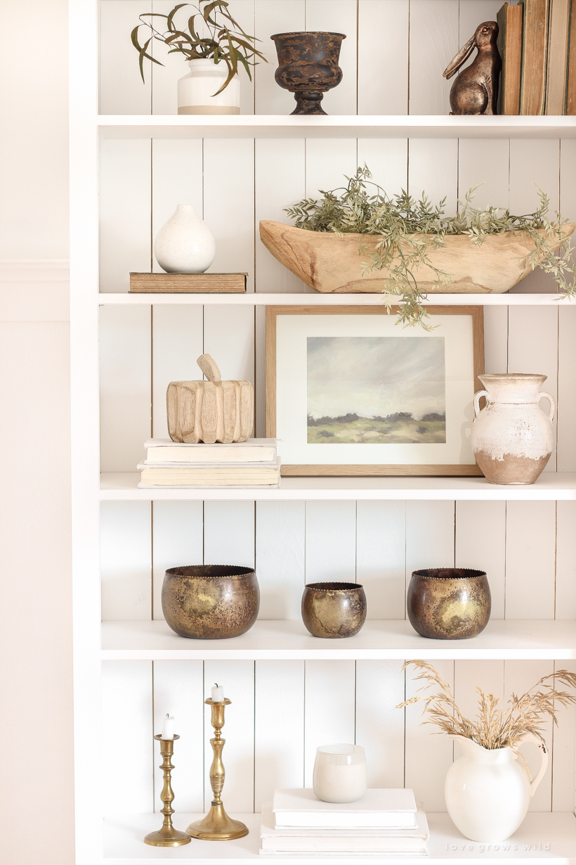 A warm and cozy living room with lots of layers, texture and pattern for fall