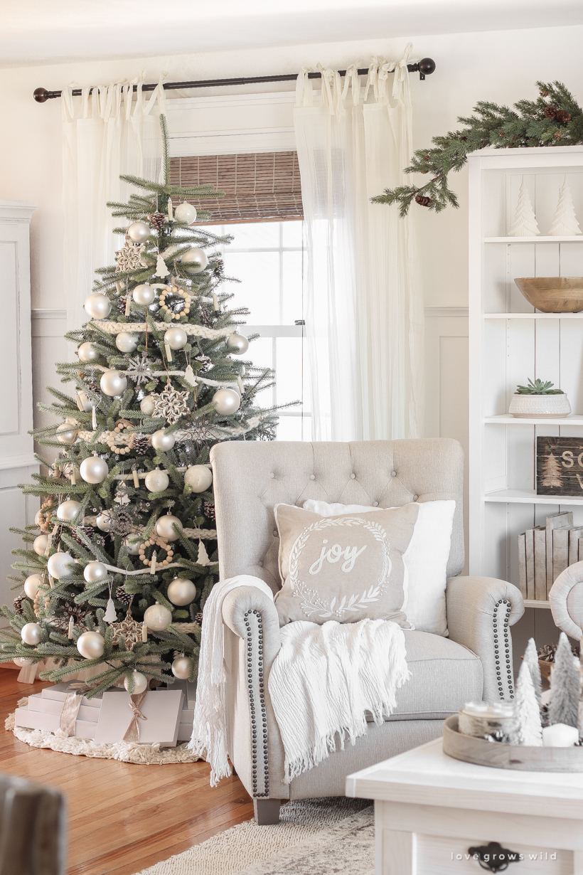 A peek inside home blogger Liz Fourez's farmhouse living room all decorated for Christmas