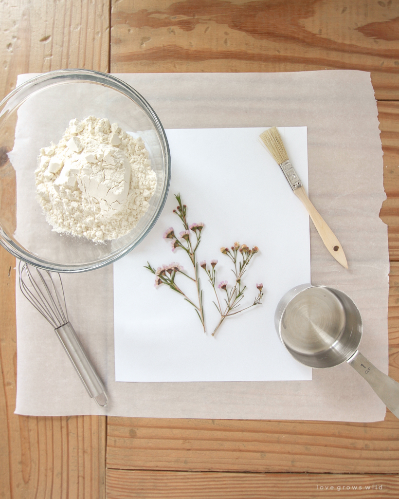 Learn how to make beautiful floral-inspired artwork on a budget with this simple Paper Mache Pressed Flower tutorial 