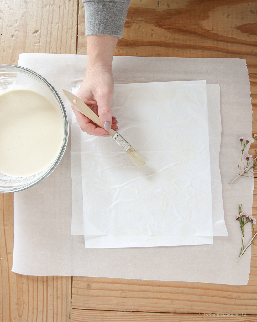 Learn how to make beautiful floral-inspired artwork on a budget with this simple Paper Mache Pressed Flower tutorial 