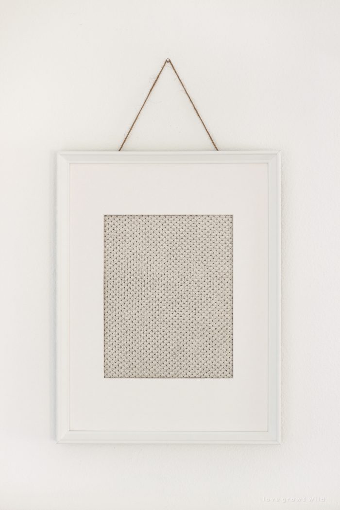 Image showcasing Fabric: A Simple Idea for Inexpensive Framed Wall Art - Love Grows Wild