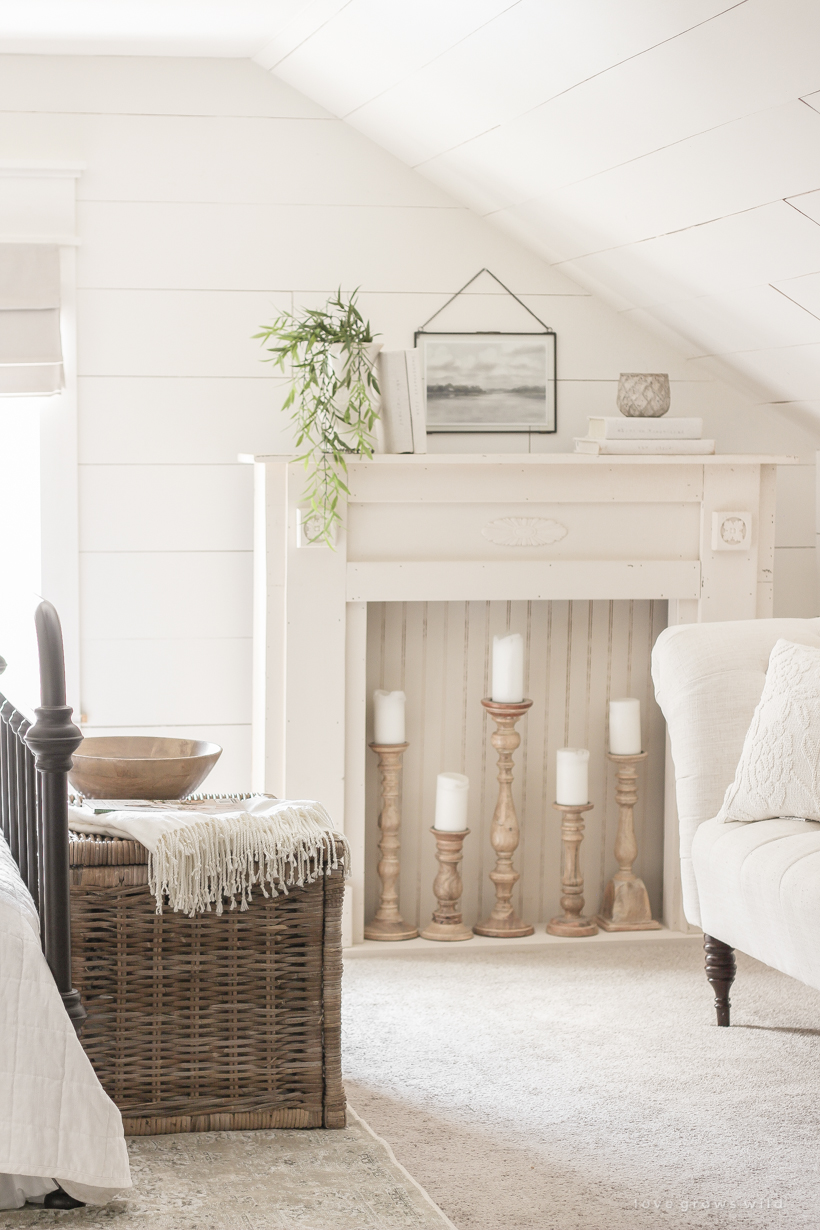 A new rug, curtains, bedding and artwork in designer Liz Fourez's beautifully cozy master bedroom