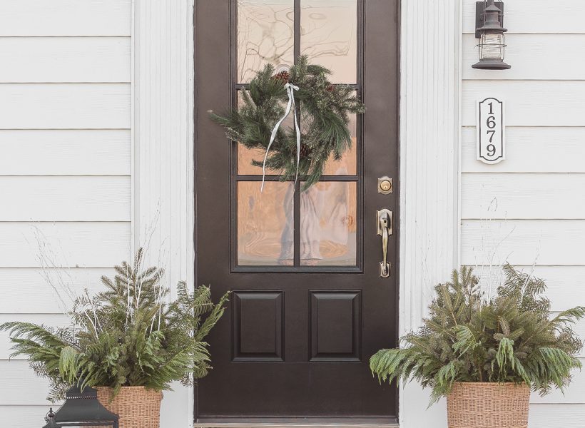 Interior decorator and home blogger Liz Fourez shares how to make these beautiful winter planters for the holidays with fresh or faux greens!