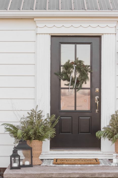 Interior decorator and home blogger Liz Fourez shares how to make these beautiful winter planters for the holidays with fresh or faux greens!