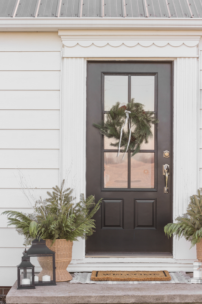 Interior decorator and home blogger Liz Fourez shares how to make these beautiful winter planters for the holidays with fresh or faux greens! 