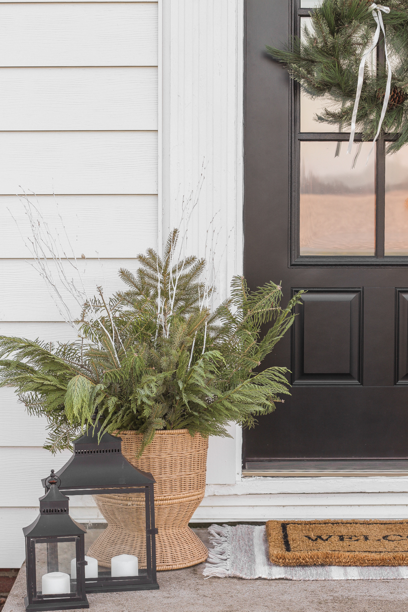 Interior decorator and home blogger Liz Fourez shares how to make these beautiful winter planters for the holidays with fresh or faux greens! 