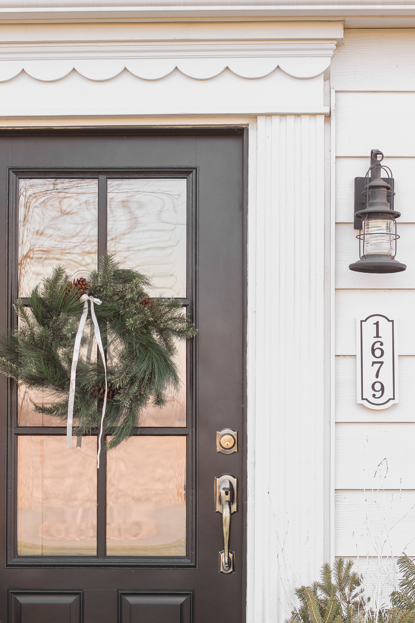 Interior decorator and home blogger Liz Fourez shares how to make these beautiful winter planters for the holidays with fresh or faux greens! 