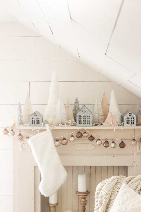 Interior decorator and home blogger Liz Fourez shares her beautiful mantel decorated for Christmas. Find out how you can build this exact mantel on LoveGrowsWild.com