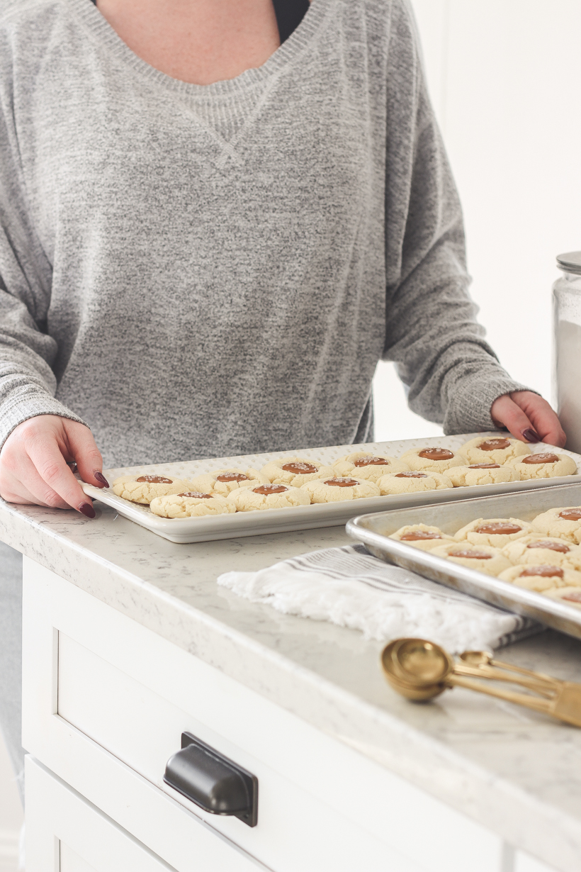 3 super easy cookie creations using pre-packaged sugar cookie mix that are SO yummy! Perfect for baking with kids or when you need a quick sweet treat! Get all 3 recipes for Snickerdoodle Bars, Salted Caramel Thumbprints, and Nutella Cookie Cups on LoveGrowsWild.com