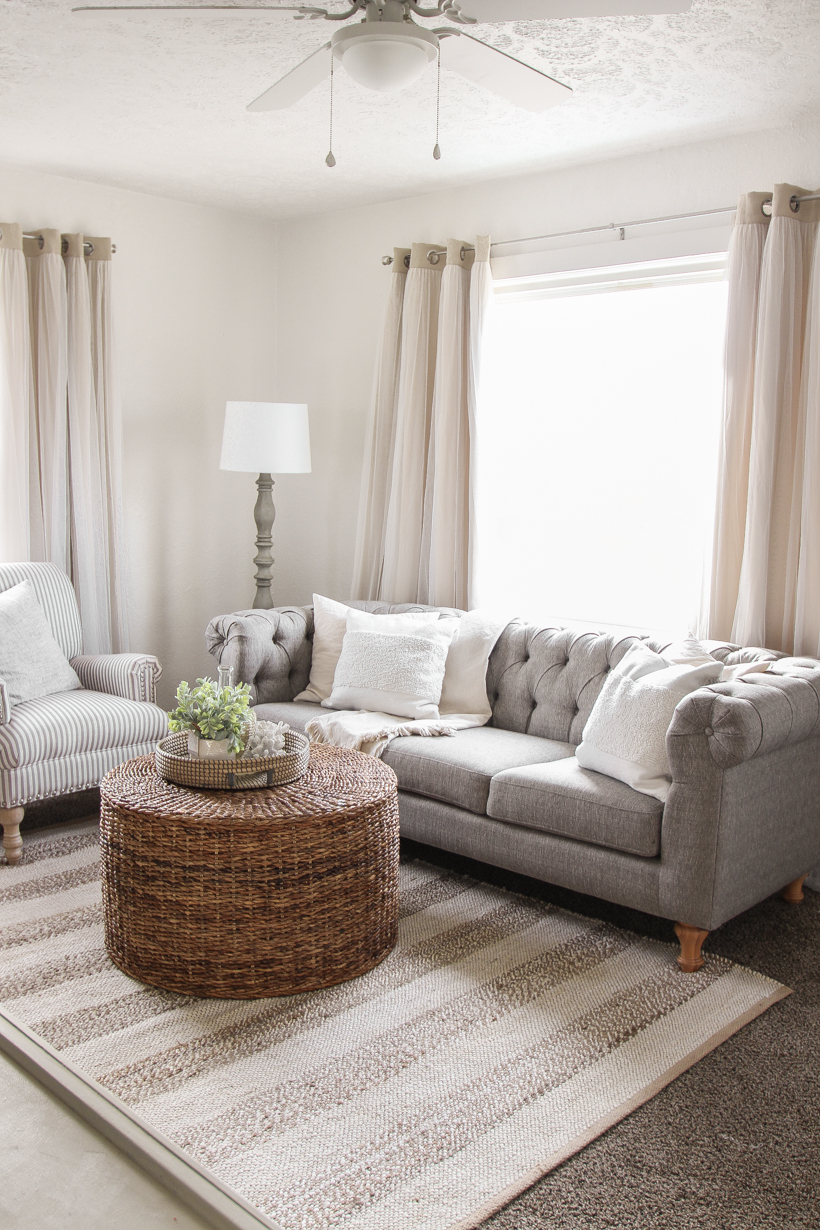 A small rental home decorated in a cozy beachy cottage style on a budget! Get all the details from home blogger and interior decorator Liz Fourez of lovegrowswild.com